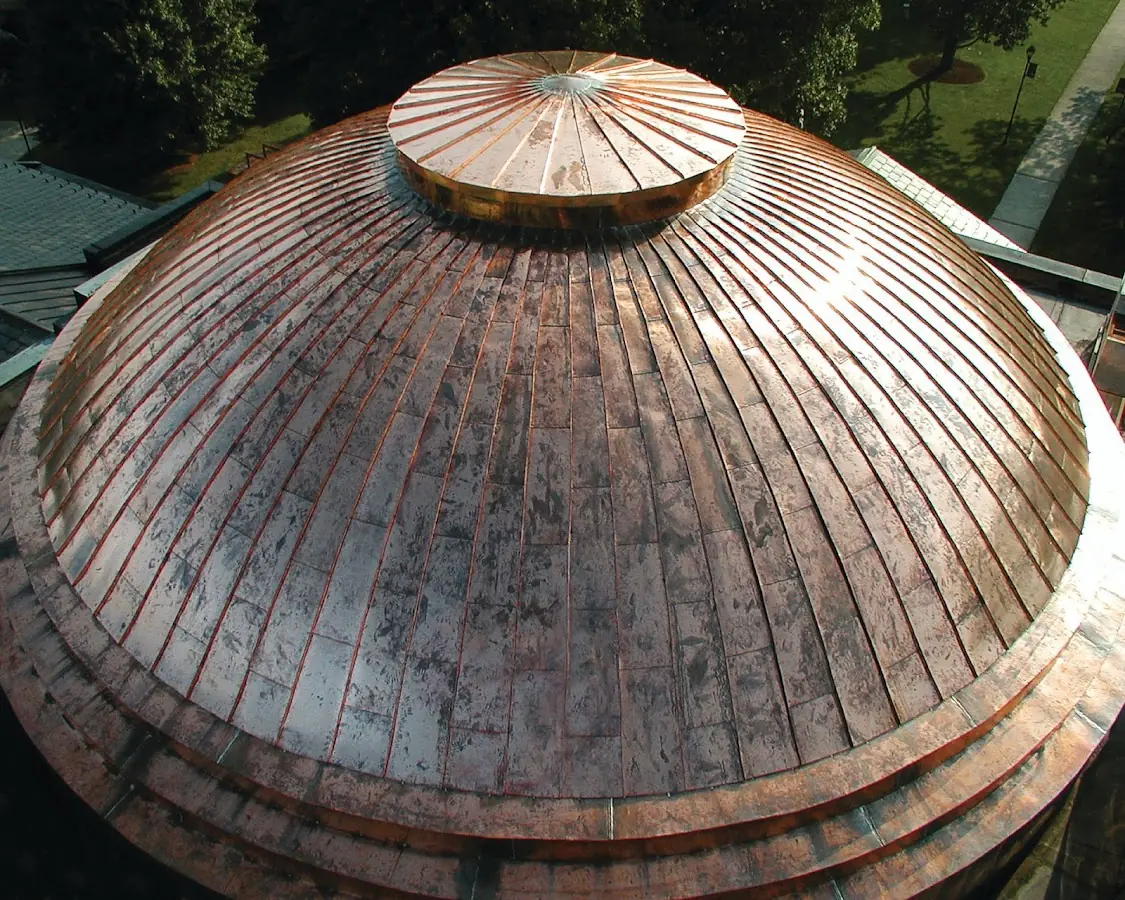 Craftsman Roofing crew installing a new roof in Tuttles Corner